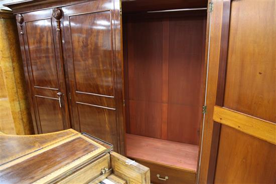 A late Victorian mahogany triple wardrobe, W.7ft 4in.